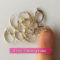 Hello,we welcome Wholesale,Please Select the "Size and Qty " When you Buy.Shape: Fleur De Lis LeverbackMaterial: 1/20 14k Yellow Gold FilledDimension Size: 16mm x 9.5mmUnit : pairsOther : High Quality, Lead Free, Nickel FreeAbout Gold FilledGold filled uses a karat gold overlay which is then bonded to a brass inner core. We  Supply gold filled with 1/20th 14 karat gold, meaning, it is 5% 14 karat gold by weight with a brass inner core. We offer 1/20 14K rose gold filled and 1/20 14K yellow gold Adjustable Gold Jewelry With Lever Back, Gold 14k Lever Back Jewelry, Gold Meaning, Ring Earring, Inner Core, Gold Overlay, Open Ring, Wholesale Jewelry, Jewelry Findings