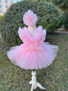 Introducing our Exquisite Pink Tutu Dress for Kids and Babies - A Magical Fairy Dress Delight! Prepare for enchantment with our meticulously crafted Pink Tutu Dress. Perfect for 1st-year birthdays, Halloween, festivals, special occasions, adorable toddler girl costumes, and as a stunning first birthday dress, this creation is a true showstopper. 👑 Unmatched Comfort: Soft Tutu on the outside, cotton lining on the inside. No itching or irritation, just pure comfort for your little fairy. 🌟 Tailored Perfection: Fully customizable for a perfect fit. Adjustable straps and elastic waist ensure your baby girl feels comfortable and looks amazing. 💖 Superior Craftsmanship: Sewn with love, this fairy dress stands out from the crowd. ✨ Unveiling the Extraordinary: 1️⃣ Premium Quality: Finest fabri Whimsical Tutu Dress For Easter Dress-up, Cute Ruffle Fairy Dress For Party, Cute Fairy Dress With Ruffles For Party, Playful Pink Fairy Dress For Party, Playful Ruffled Fairy Dress For Party, Playful Fairy Dress With Ruffles For Party, Cute Birthday Fairy Dress With Ruffles, Cute Fairy Dress With Ruffles For Birthday, Whimsical Ruffled Fairy Dress For Party