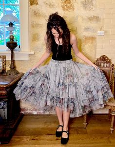 This amazing tulle tutu skirt is designed so you can wear the high low either in the front ( short in the front long at the back ) or on the side with the shorter length at the side  The skirt can also be worn as a dress by pulling it up on top of the bust . The elastic is very soft and comfortable but firm holding it up in place should you want to wear it as a dress .  It's lined to the knee and has the most fantastic profile , so so full of delicious floral tulle in a beautiful seafoam pale rose bouquet floral tulle .  This beautiful Ballerina tutu can be worn Winter ( with boots , leggings , sweater ) or in the warmer months with sandals and a shirt cropped top or blouse one size .. it's very generous and will fit a petite figure like our model up to a size 18 Boots Leggings, Ballerina Tutu, Tulle Tutu Skirt, Tulle Tutu, Tutu Skirt, Rose Bouquet, High & Low, The Knee, High Low