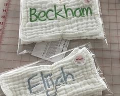 two pieces of cloth that have been sewn together with the words, rockham and elgin printed on them