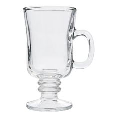 a clear glass mug is shown on a white background, with the handle slightly extended