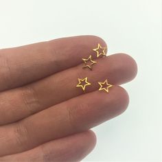 Tiny star earring gold and silver stud gold star studs tiny | Etsy Celestial Star Cartilage Earrings As Gift, Tiny Gold Star Cartilage Earrings, Gold Nickel-free Star Cartilage Earrings, Gold Star Cartilage Earrings Nickel Free, Gold Star Cartilage Earrings In Minimalist Style, Gold Star Cartilage Earrings Minimalist Style, Dainty Star Charm Piercings For Gifts, Gold Piercings With Star Charm As Gift, Celestial Star-shaped Piercings As Gift