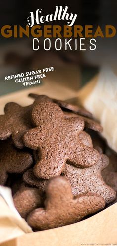 a close up of some cookies in a box with the words healthy gingerbread cookies