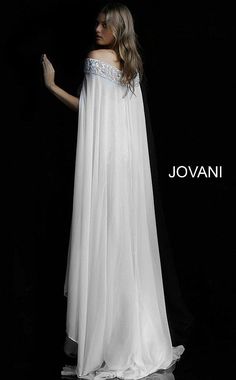 a woman in a white dress standing on a black background with the words jovanii