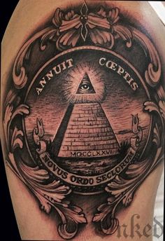 an all seeing eye tattoo on the arm