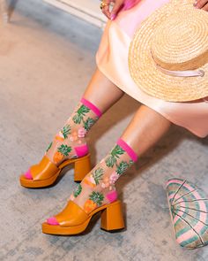 Perfect for your next vacation, our Tropical Pineapples Sheer Crew Sock features color blocked pineapples in pink and orange interspersed with Hawaiian leaves. These cheerful pineapple socks will have you on island mode in no time! This item is final sale. One Size. Recommended fit US W5.5-10. 200 Needle Count. ✨ Funky yet elegant - no silly or childish patterns 🧦 Premium quality - durably made with comfortable stretch 👗 Unique - the perfect accessory to add individuality to your outfits Fun Multicolor Summer Socks, Trendy Orange Socks For Spring, Casual Pink Socks For Summer, Fun Pink Socks For Summer, Playful Pink Summer Socks, Trendy Yellow Summer Socks, Playful Yellow Socks For Summer, Sock Candy, Hawaiian Leaves