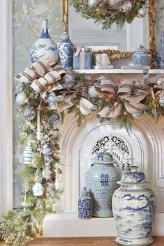 a mantel decorated with blue and white vases