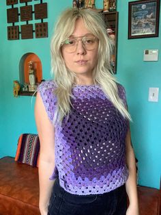 Handmade crochet granny square sweater vest. This top is reversible and unisex (front and back are the same). Wool/acrylic blend. Purple ombre. Best fit for a medium or a large; it's stretchy! Hand wash and lay flat or hang to dry. Crochet Granny Square Sweater Vest, Granny Square Sweater Vest, Crochet Granny Square Sweater, Sleeveless Sweaters, Square Sweater, Crochet Sweater Vest, Granny Square Sweater, Sleeveless Jumper, Crochet Granny Square