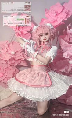 a doll is posed in front of pink flowers