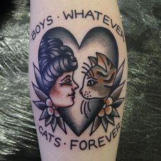 a tattoo on the leg of a woman with a cat's face and words that say boys, whatever cats forever