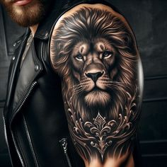 a man's arm with a lion tattoo on it, and an ornate design