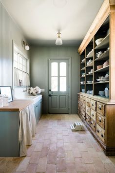 the kitchen is clean and ready to be used for cooking or baking, while also being used as a dining room