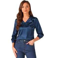 This satin blouse is actually a versatile product. Wear this and effortlessly create a stunning and chic look. It can be graceful and elegant at work, while it can be cute and playful in daily life. The slightly shiny satin fabric provides you with a comfortable and soft touch. The long sleeves are matched with a shirring design and button cuffs, with a sense of detail and elegance. The V-neck design is stylish and classic and adds a touch of charm to the casual look. It is a must-have piece in Elegant 3/4 Sleeve Workwear Blouse, Elegant 3/4 Sleeve Blouse For Work, Elegant Solid Color Top With 3/4 Sleeves, Elegant Blue Half Sleeve Top, 3/4 Sleeve Blouse For Workwear, Elegant Half Sleeve Tops For Workwear, Elegant Formal Blouse With 3/4 Sleeves, Blue V-neck Office Blouse, Blue V-neck Blouse For Office Wear