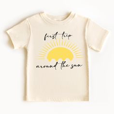 Celebrate your little one's 1st birthday in style with this adorable sun shirt! Perfect for a fun and sunny birthday party, this shirt features a cheerful design that will make your little one stand out. Made with soft and breathable fabric, this shirt is both cute and comfortable for your baby to wear all day long. Add a special touch to your little one's birthday celebration with this 1st birthday sun shirt! + Machine washable & dryer safe (I recommend drying on delicate) + Design color will d Summer Playtime Tops With Letter Print, Cotton Tops With Upf 50+ For Summer, Summer Fun Playtime Shirt, Fun Summer Playtime Shirt, Summer Graphic Tee For Playtime, Graphic Tee For Summer Playtime, Graphic Tee T-shirt For Summer Playtime, Yellow Tops For Summer Birthday, Fun Summer T-shirt For First Birthday