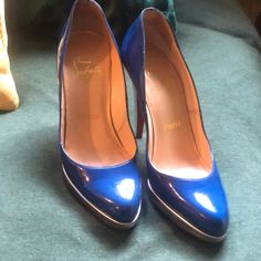 Beautiful Silver And Blue Christian Louboutin Heels. They Have Been Resoled, And Have Some Wear On The Heel And A Scuff On The Back As Seen In The Pictures. These Are A Size 37 So They Would Best Fit A 6.5-7. Unfortunately I Don’t Have The Dust Bag Anymore. Blue Patent Leather Heels With Reinforced Heel, Blue Patent Leather Heels With Sculpted Heel, Blue Patent Leather Heels For Formal Occasions, Blue Heels With Branded Insole For Evening, Formal Blue Patent Leather Heels, Blue Patent Leather Party Heels, Blue Patent Leather Heels For Party, Luxury Blue Heels With Sculpted Heel, Luxury Fitted Blue Heels