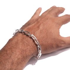 "A bold and textured 925 Sterling silver Chunky Rectangular Bracelet with a unique T-clasp for both men and women. Makes a bold statement piece by itself or layer it for a more rock and roll style. Bracelet Length 16cm / 6.3\" 18cm / 7.09\" 20cm / 7.87\" 22cm / 8.66\" 24cm / 9.45\" 26cm / 10.24\" Every piece is handcrafted in Bali and made with Intention, Love, and Soul so that it can be felt by its wearer and ultimately change our energy and lives in a positive way.  Each with its own story of Silver Chain Bracelet With Rectangular Solid Links, Rectangular Silver Chain Bracelet With Solid Link, Silver Rectangular Chain Bracelet For Everyday, Sterling Silver Rectangular Chain Bracelet For Everyday, Sterling Silver Rectangular Bracelet With Silver Chain, Everyday Sterling Silver Rectangular Chain Bracelet, Modern Sterling Silver Bracelet, Rectangular Shape, Modern Sterling Silver Rectangular Bracelet, Modern Silver Rectangular Chain Bracelet