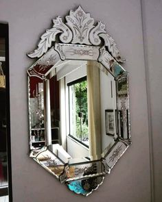 a mirror that is hanging on the wall