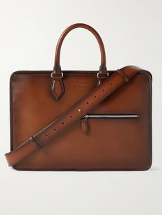 Berluti's skill in crafting leather has attracted clients from The Duke of Windsor to Andy Warhol. Made in Italy, this classic briefcase has two slip pockets, along with a two-way zip fastening and the house's logo embossed on the front. The adjustable shoulder strap can be detached, so you can carry the it by hand. Designer Leather Briefcase For Business Meetings, Luxury Bridle Leather Formal Briefcase, Luxury Bridle Leather Briefcase For Formal Use, Duke Of Windsor, Leather Briefcase Men, Briefcase For Men, Home Logo, Leather Briefcase, Andy Warhol