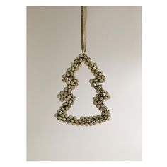 a beaded ornament hanging from a string