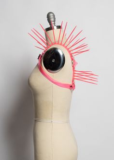 The neon version of the Replicant Chest Harness! Cyberpunk inspired harness made in colorful PVC. Dramatic spikes fan out at the shoulder to create a striking, avant garde, futuristic look. Fit is adjustable with buckle at chest. Silver-toned nickel plated steel hardware. Spikes are plastic zip ties/cable ties and are lightweight and flexible. Available in neon pink (shown) or lime green. Neon pink and neon orange PVC areUV reactive, the lime green PVC is NOT. All spikes colors are UV reactive. Chest Harness, Rave Festival, Neon Orange, Make Time, Festival Fashion, Neon Pink, Custom Fit, Cyberpunk, Lime Green