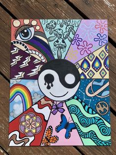 a colorful painting with an animal face on it's side and many other things in the background