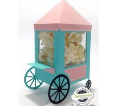 a small cart with popcorn in it