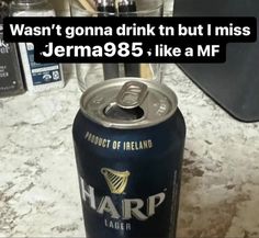 a can of beer sitting on top of a counter