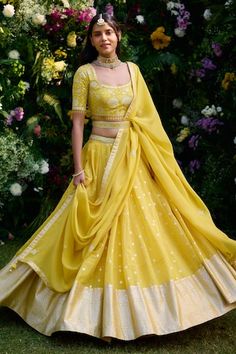 Daffodil yellow chanderi brocade and satin lehenga with an attached cancan and floral and thread patchwork embroidery. Comes with a padded blouse, an organza dupatta and a belt. - Aza Fashions Lavender Yellow Outfit, Pastel Yellow Lehenga, Pastel Lehenga Simple, Simple Lengha Design, Pastel Lavender Lehenga, Yellow Outfit For Haldi Function, Sreeja Wedding, Lahanga Design Latest, Yellow Half Saree