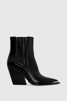 Elevate your look in the West Bootie. Crafted with luxe leather, a sleek pointed toe, and a comfortable block heel, this bootie effortlessly combines style and comfort. Style #: WESTBOOT01 Leather Heel Height: 2. | Rebecca Minkoff West Bootie In Black - Size 6