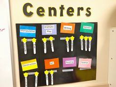 a bulletin board with different types of toothbrushes and writing on it that says centers