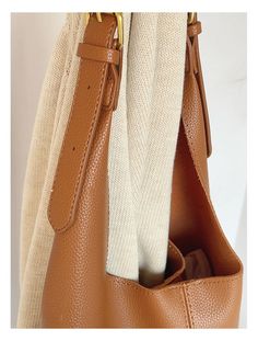 2023 new style. Simple leather tote bag. Material: High Quality PU Leather Size: 14.1"H x 10.6"W x3.9"D Designer Style ID: 8567 Leather Tote Bag with Shoulder Strap and Inner Pouch Beige Bucket Bag With Large Capacity For Office, Beige Bucket Bag For Office With Large Capacity, Beige Office Bucket Bag With Large Capacity, Fall Top Handle Hobo Bag With Large Capacity, Fall Large Capacity Beige Shoulder Bag, Light Brown Leather-handled Bucket Tote Bag, Light Brown Bucket Bag With Leather Handles, Light Brown Tote Shoulder Bag For Shopping, Light Brown Large Capacity Bucket Bag With Double Handle