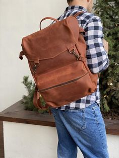 SEE MORE BACKPACKS IN OUR SHOP https://www.etsy.com/shop/LeatheryCo?ref=seller-platform-mcnav&section_id=28892568One of the best selling backpacks of this season. Can serve as a gift to your family members or just a friend. We can put your initials on this product or perform any other modification, especially for you!░░░░░░░░░░░░░░░░░░░PERSONALIZATION:░░░░░░░░░░░░░░░░░░░Pick any idea to make engraving- Engrave your initials or name;- Engrave your logo;- Engrave your text;░░░░░░░░░░░░░░░░░░░M Cognac Leather-lined Backpack, Cognac Leather-backed Backpack For Travel, Outdoor Leather-backed Backpack, Brown Vegetable-tanned Leather Backpack For Travel, Leather Backpacks School, Leather Travel Backpack, Mens Leather Backpack Under 200.00, Laptop Backpack Mens, Convertible Backpack Purse