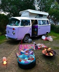 a camper van is parked in the dirt