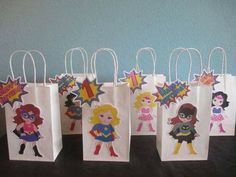 small paper bags with cartoon characters on them