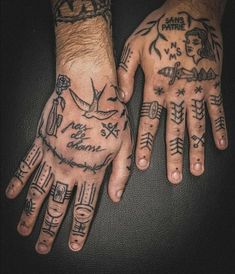 two hands with different tattoos on them