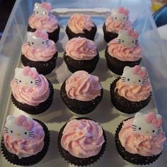 hello kitty cupcakes with pink frosting in a plastic container