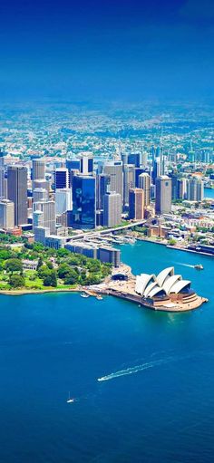 an aerial view of sydney, australia with the opera house and city in the background