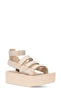 This sporty gladiator sandal revamp is boosted by a chunky platform sole, hook-and-loop closures and a removable ankle strap for added versatility. 1 3/4" platform Textile and leather upper and lining/rubber sole Imported Platform Open Toe Sport Sandals For Streetwear, Platform Sport Sandals For Streetwear, Platform Sandals With Ankle Strap For Streetwear, Ankle Strap Platform Sandals For Streetwear, Streetwear Ankle Strap Platform Sandals, Adjustable Platform Sport Sandals With Ankle Strap, Adjustable Ankle Strap Platform Sport Sandals, Chunky Platform, Fabric Gift Bags