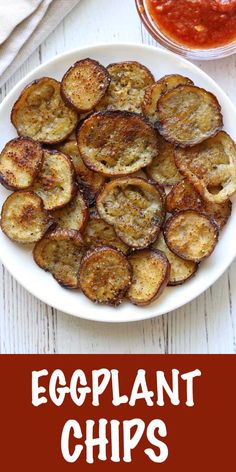 eggplant chips on a plate with ketchup and sauce in the background