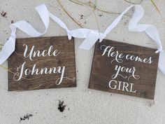 two wooden signs that say uncle johnny and uncle johnny, here comes your girl on them