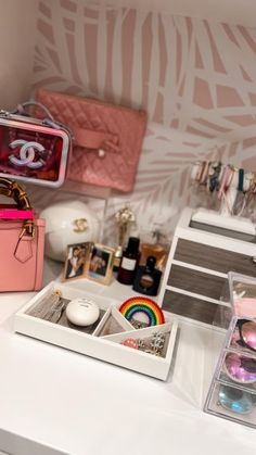 the vanity is filled with cosmetics and accessories