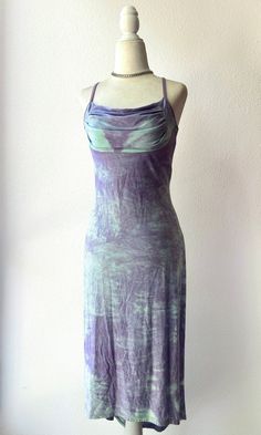 Size L, best fits S/M! Gorgeous vintage midi dress with a cowl neck, a slight hi low bottom hem & cross crossed straps. Made of a stretchy sparkly pastel blue and lilac tie dye fabric. Unlined. Excellent condition, only flaw is some slight wear on the straps Measurements (laying flat)- bust: 15.5" waist: 14" length: 49" @ longest point Seen on a size 4/6 mannequin  Message me with any questions! :) Sparkly Slip Dress, Tie Dye Dress Outfit, 2000s Prom Dress, Satin Outfit, Vintage Midi Dress, Vintage Midi Dresses, Tie Dye Fabric, Dye Fabric, Dresses Aesthetic