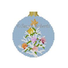 a cross stitch christmas ornament with flowers and stars on the top, in blue