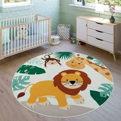 a baby's room with a rug that has animals on it