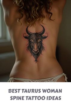 the back of a woman's body with tattoos on it and an image of a bull