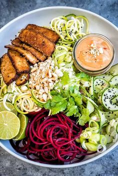 a bowl filled with different types of food