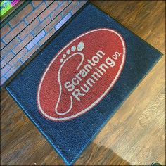 a blue door mat with the words salmon king on it