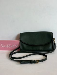 Vtg Coach Original  Sterling Clutch Green color leather with brass hardware Roomy interior with zip pocket covered by a flap and secured with a magnetic button Adjustable strap Strap drop 20"-24" Measures: 9.5"L, 7"H, 2"W Made in the United States #A4B-9455 Hang tag and chain Flaws: stain under flap and front that did not remove during cleaning Cleaned, conditioned and ready to wear! Questions? Just ask More vtg coach styles/colors also available G78 Luxury Coach Bag With Chain Detail, Luxury Clutch Shoulder Bag By Coach, Luxury Coach Bags With Turn-lock Closure, Coach Outlet Nylon Bags, Luxury Coach Clutch Shoulder Bag, Luxury Coach Clutch, Coach Cashin 29, Luxury Coach Evening Wallet On Chain, Scooter Bags