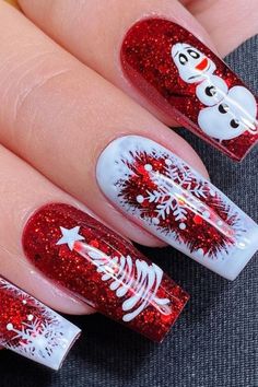 Get into the holiday spirit with this enchanting Christmas nail design! ❄️ Featuring an adorable Olaf snowman, sparkly red glitter, delicate snowflakes, and a minimalist Christmas tree, this festive manicure captures all the magic of winter. Perfect for holiday parties, Christmas celebrations, or adding some Disney charm to your winter look! #ChristmasNails #ChristmasNailArt #HolidayManicure #ChristmasTree #RedGlitterNails #FestiveNails Snowman Nail Design, Snowman Nails Christmas, Christmas Nail Designs Red And Green, Christmas Glitter Nails Sparkle, Sparkly Red Christmas Nails, Disney Christmas Nail Art, Frosty The Snowman Nails, Christmas Nails With Charms, Almond Christmas Nails Winter