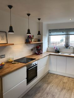 the kitchen is clean and ready for us to use in its new owner's home